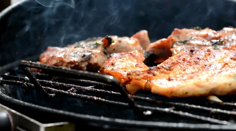 Grilled meat on grill Stock Footage 39436944