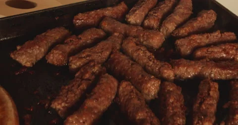 Grilled meat on grill Stock Footage 144840270