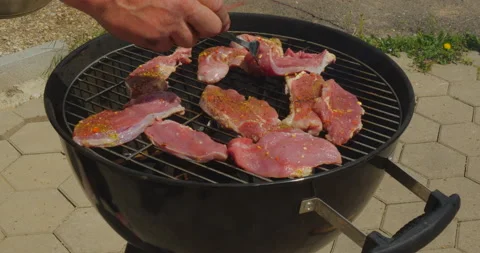 Grilled meat on grill Stock Footage 144841196