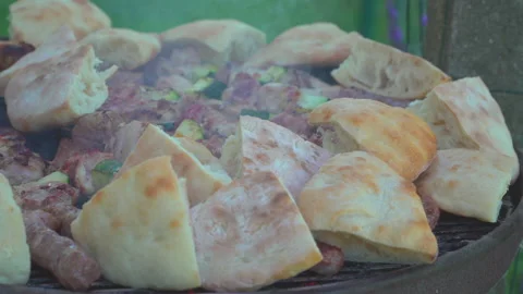 Grilled meat on grill Stock Footage 145819015