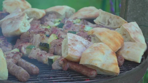 Grilled meat on grill Stock Footage 145819318