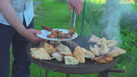 Grilled meat on grill Video stock 145819970