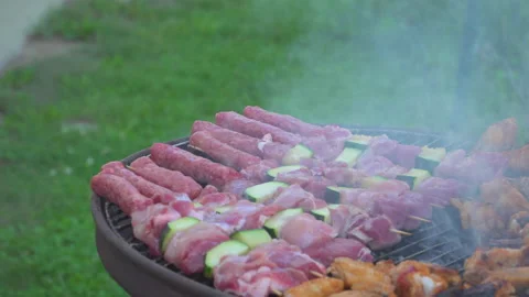 Grilled meat on grill Stock Footage 145820228