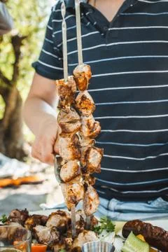 Grilled meat on the grill Stock Photos