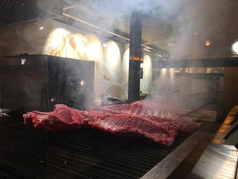 Grilled meat at the kitchen. Stock Photos