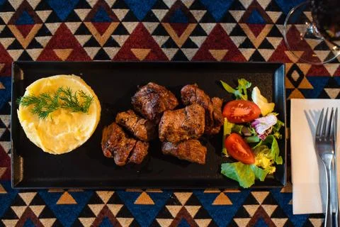 Grilled Meat with Mashed Potatoes and Salad Stock Photos