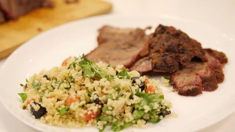 Grilled meat served with selectable sides feast for any occasion Witness mastery Stock Footage 273759282