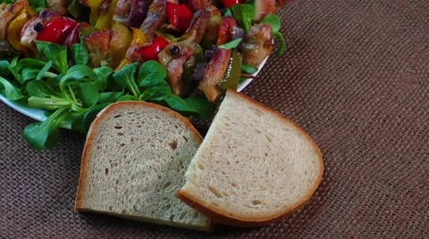 Grilled meat skewers with vegetables Video stock 59435048