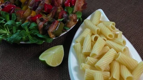 Grilled meat skewers with vegetables Stock Footage 59435076