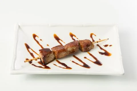 Grilled meat on stick Stock Photos