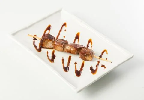 Grilled meat on stick Stock Photos