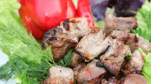 Grilled meat with vegetable on rotating table 库存影片 709148