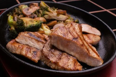 Grilled Meat with vegetables Stock Photos