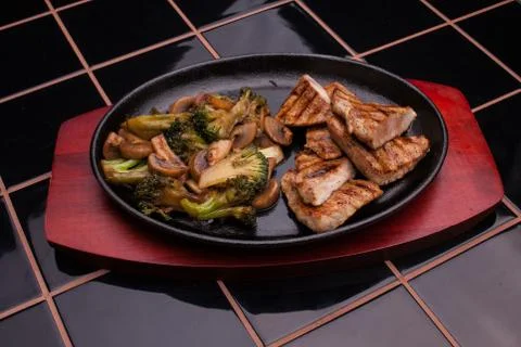 Grilled Meat with vegetables Stock Photos