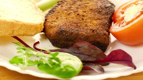 Grilled meat on a white plate Stockbeeldmateriaal 47155776