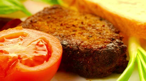 Grilled meat on a white plate Stock Footage 47155938