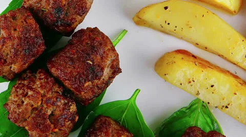 Grilled meatballs on white Vídeos de archivo 25166348