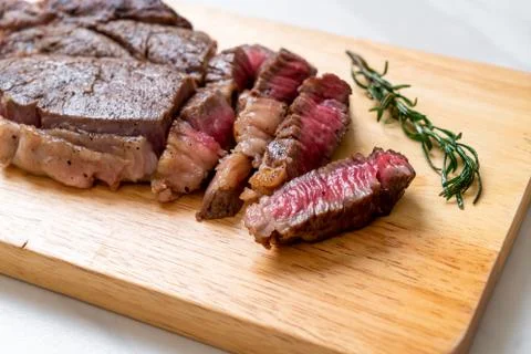 Grilled medium rare beef steak Stock Photos