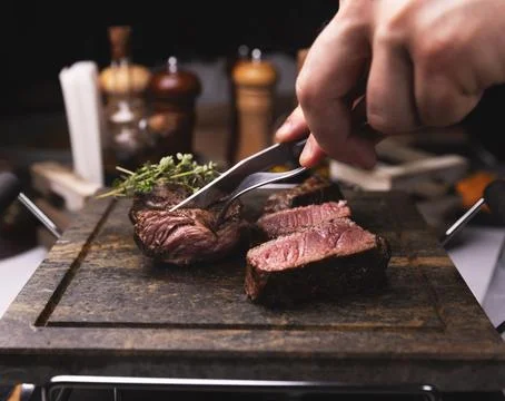 Grilled medium rare steak Stock Photos