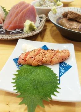 Grilled Mentaiko Spicy Cod Roe with Japanese Perilla Leaf Stock Photos