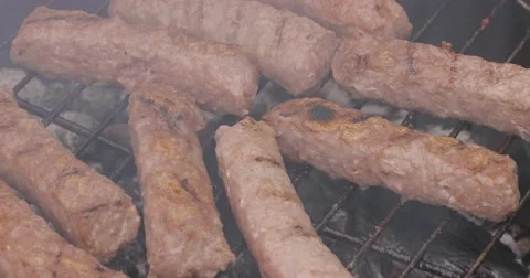 Grilled minced meat is smoked on the grill Stock Footage 62800853