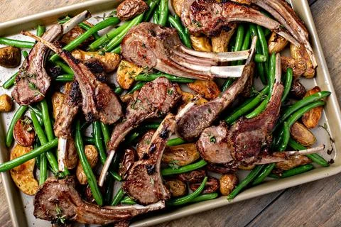 Grilled or roasted lamb chops with green beans and potatoes Stock Photos