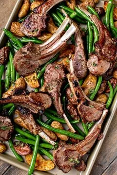Grilled or roasted lamb chops with green beans and potatoes Stock Photos
