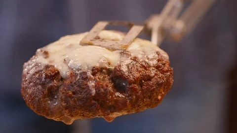 Grilled patty placed on the bun Stock Footage 85812993