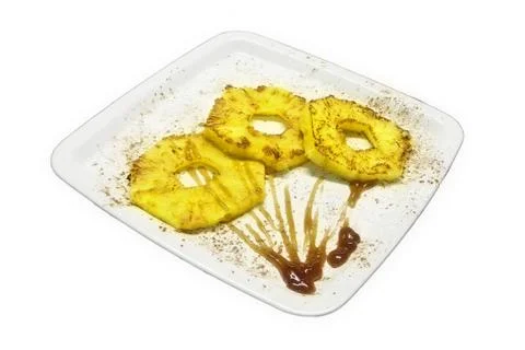 Grilled pineapple with maple topping Stock Photos