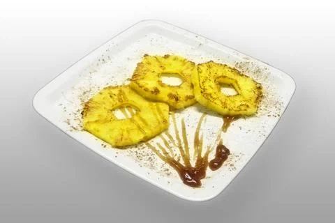 Grilled pineapple with maple topping Stock Photos