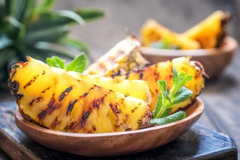 Grilled pineapple slices Stock Photos