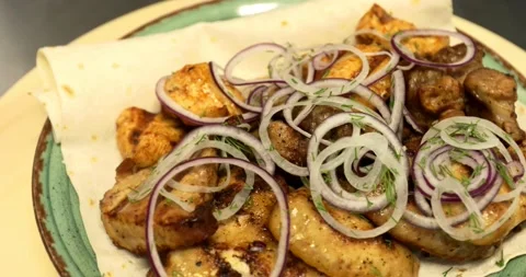 Grilled pita bread rotates on a plate. Rotating dish. Stock Footage 159160760