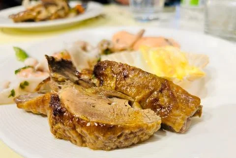 Grilled pork chops with boiled egg and salad. Stock Photos
