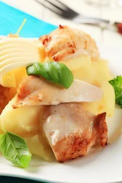 Grilled pork with mashed potatoes and basil Stock Photos