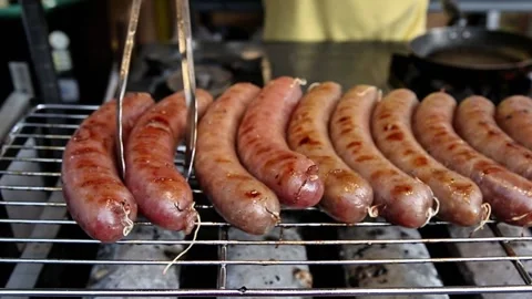 Grilled pork sausage while behind the sausage 動画素材 272298226