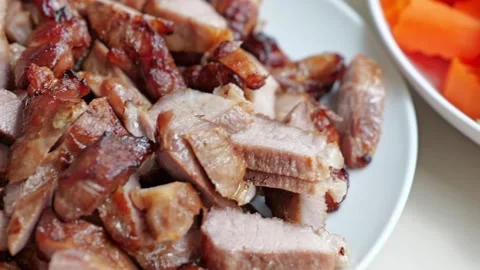 Grilled Pork Slice Cooked Meat Plate with Broccoli Carrot and Crispy Browned Stock Footage 346328412
