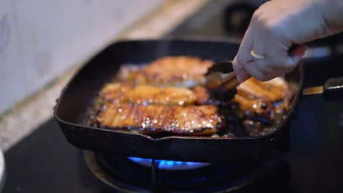 Grilled pork steak on the pan Stock Footage 111144274