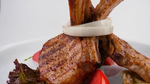Grilled Rack of Lamb or Veal with vegetables, Restaurant food Stock Footage 79712821