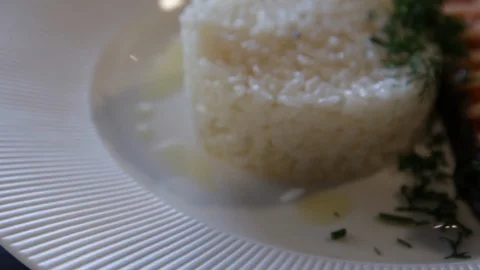Grilled red fish, served with rice and lemon. high protein foods. the camera Stock Footage 114699885