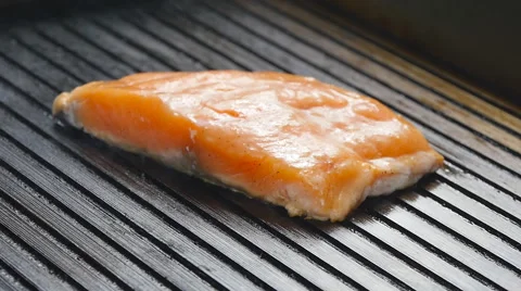 Grilled red fish steak salmon on the grill pan Stock Footage 65120176