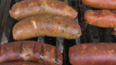 Grilled with rib of beef, chistorra and sausages. Golden sausages Stock Footage 155304461