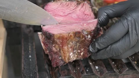 Grilled with rib of beef, chistorra and sausages. Golden sausages Stock Footage 155304502