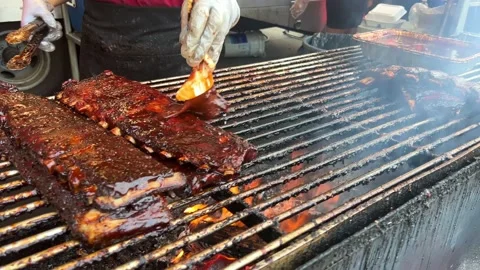 Grilled ribs small eatery restaurant for cooking meat on Bonfire fire Barbecue Stock Footage 206805815