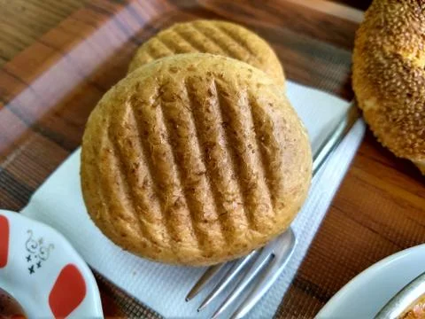 Grilled round bread at breakfast Stock Photos