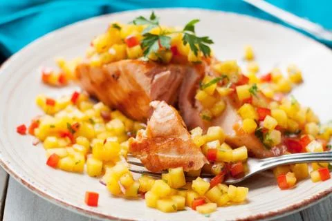 Grilled salmon with mango salsa Stock Photos