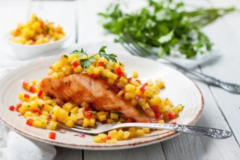 Grilled salmon with mango salsa Stock Photos