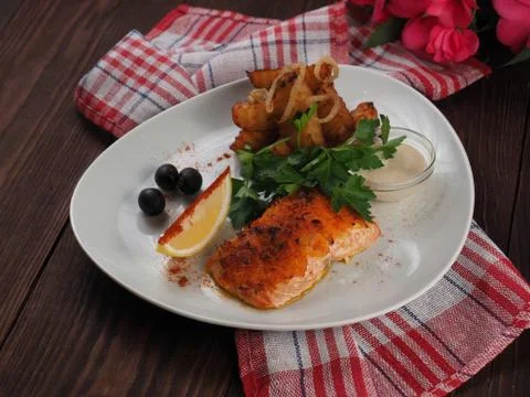Grilled salmon with potatoes Stock Photos