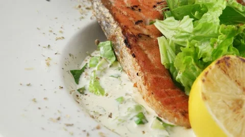 Grilled salmon steak with spinach Stock-Footage 57138686