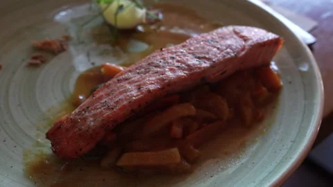Grilled salmon steak with vegetables. Close-up. Stock Footage 248539574