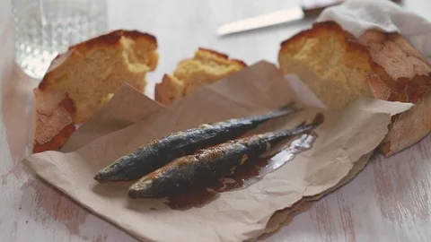 Grilled sardines with cornbread Stock Footage 91724323